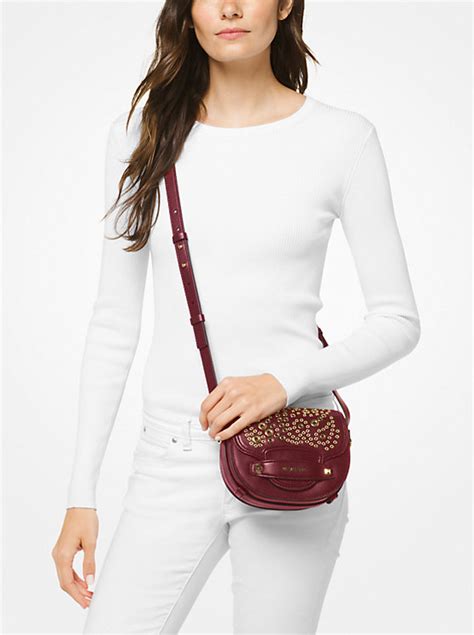 michael michael kors cary small leather saddle bag|michael kors triple compartment bag.